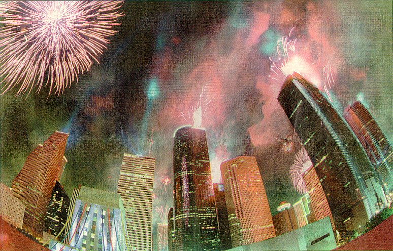 This is a color photo taken with a fish-eye lens.  The picture shows Houston's beautiful skyline with fireworks being shot from the tops of downtown buildings.