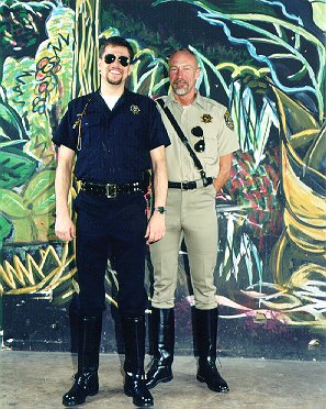 Officer Wes and rookie boy tim in uniform